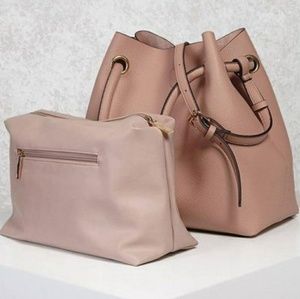 Blush colored faux leather bag